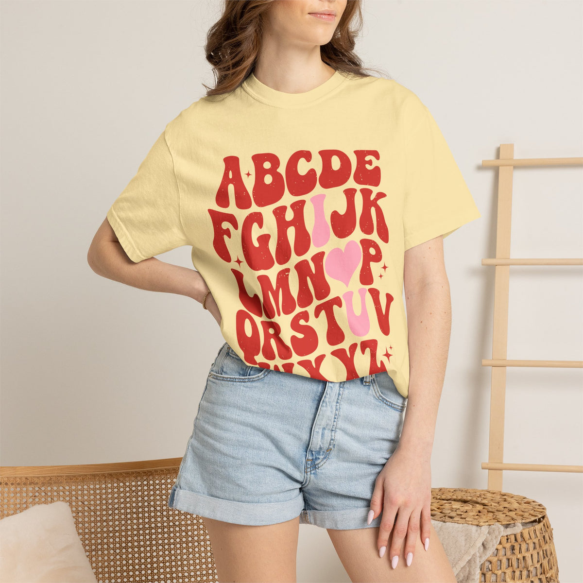 Retro Heart Alphabet T‑Shirt — Groovy Red Lettering Tee with Heart Accent