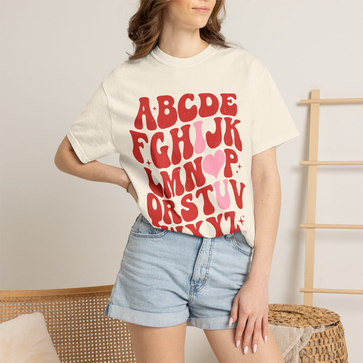 Retro Heart Alphabet T‑Shirt — Groovy Red Lettering Tee with Heart Accent