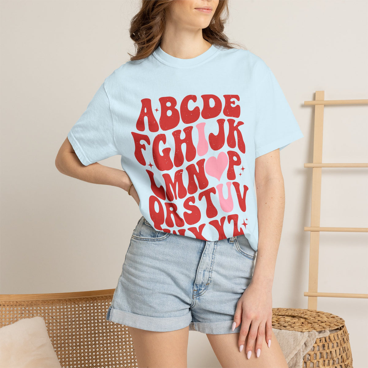 Retro Heart Alphabet T‑Shirt — Groovy Red Lettering Tee with Heart Accent