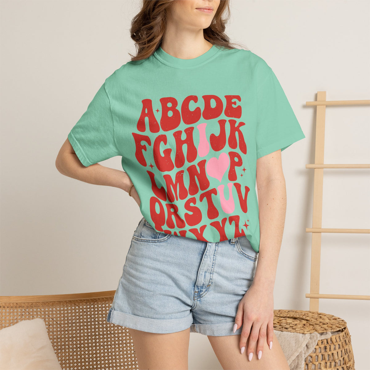 Retro Heart Alphabet T‑Shirt — Groovy Red Lettering Tee with Heart Accent