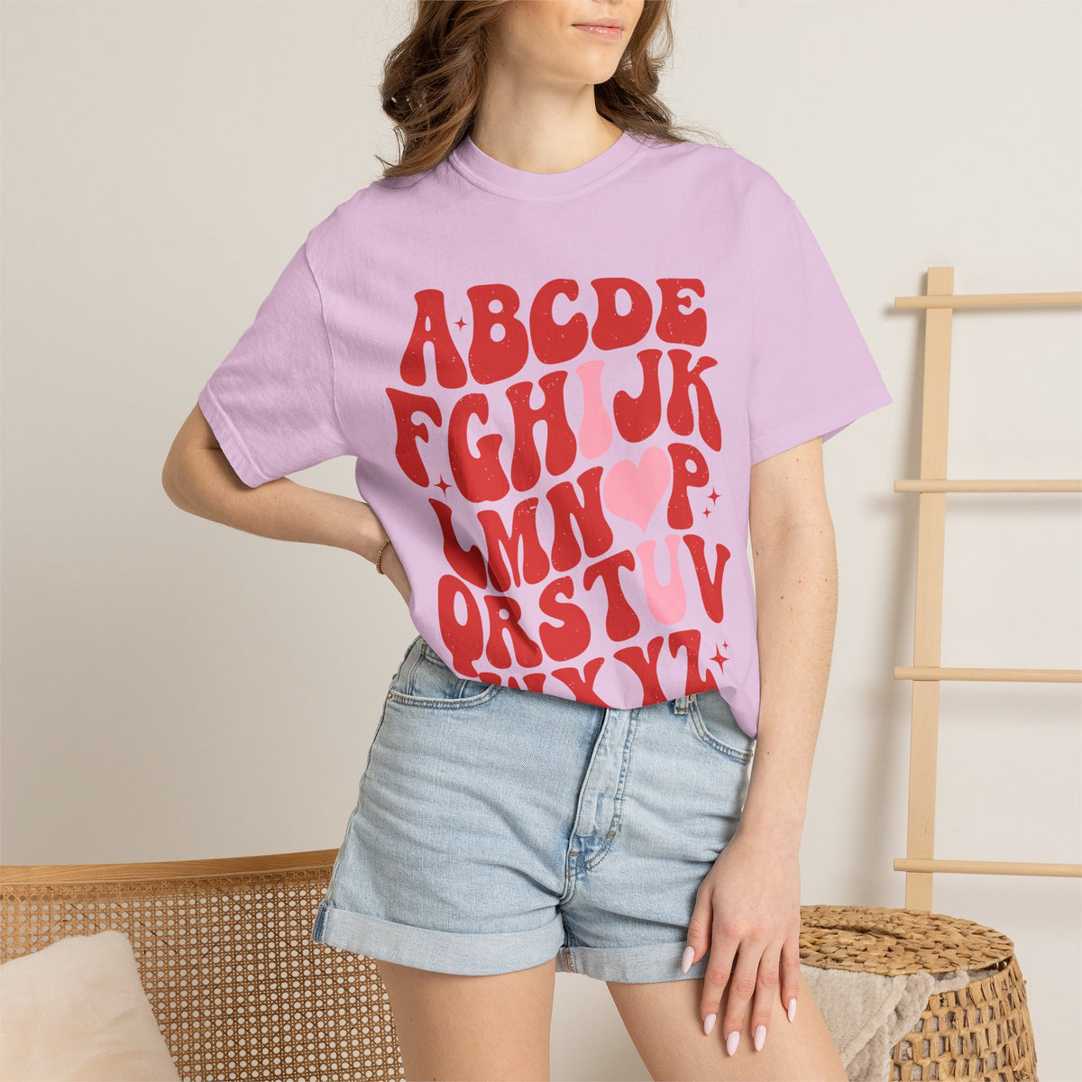 Retro Heart Alphabet T‑Shirt — Groovy Red Lettering Tee with Heart Accent