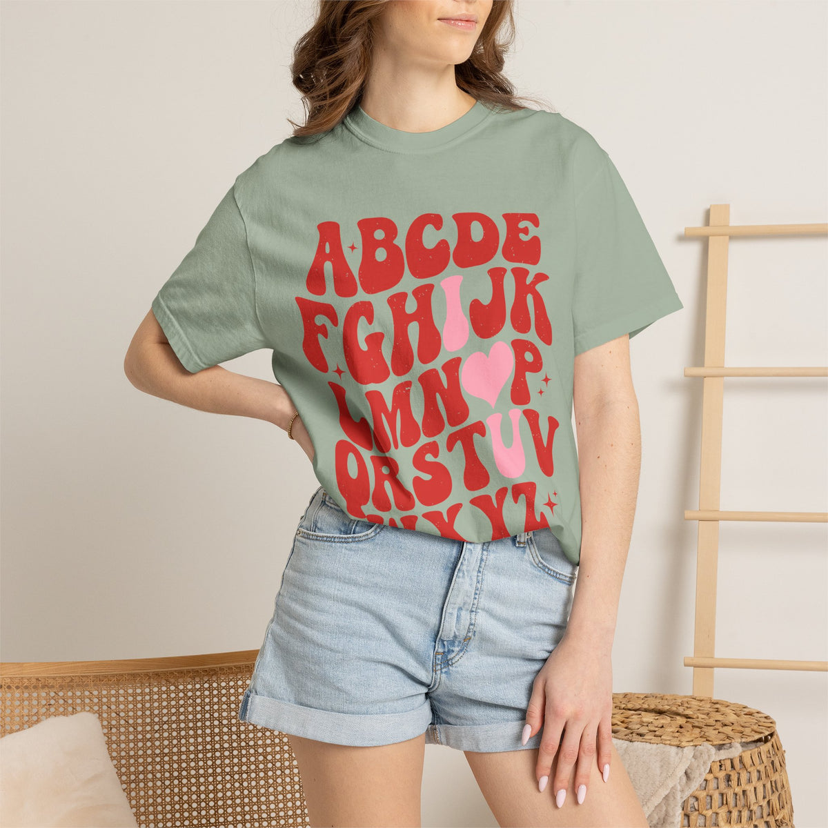 Retro Heart Alphabet T‑Shirt — Groovy Red Lettering Tee with Heart Accent